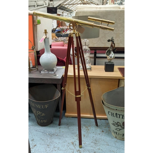 396 - TELESCOPE, gilt metal, on tripod stand, 198cm H at tallest.