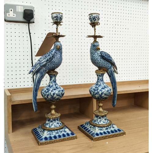 405 - CANDELABRA, a pair, 48cm H, in the form of cockatoos, blue and white ceramic, gilt metal mounts. (2)