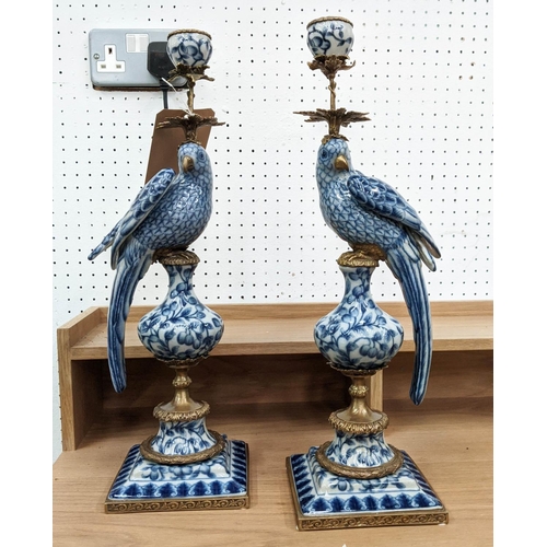 405 - CANDELABRA, a pair, 48cm H, in the form of cockatoos, blue and white ceramic, gilt metal mounts. (2)