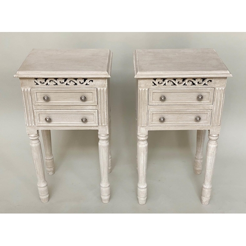 166 - BEDSIDE CHESTS, a pair, French traditionally grey painted with pierced frieze and two drawers, 40cm ... 