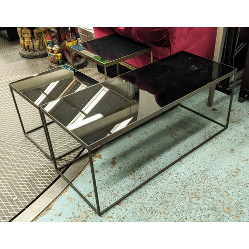 409 - LOW TABLES, a graduated set of three, 105cm x 43cm sq. at largest, bronze metal, black glass tops. (... 