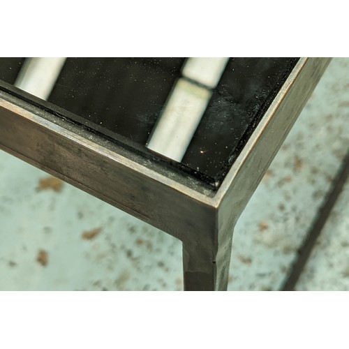 409 - LOW TABLES, a graduated set of three, 105cm x 43cm sq. at largest, bronze metal, black glass tops. (... 