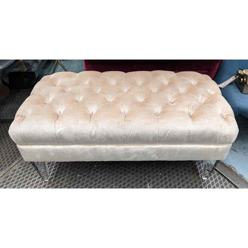 283 - FOOTSTOOL, 105cm W x 48cm H x 55cm W, in buttoned Champagne velvet on perspex supports.