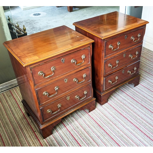 150 - BEDSIDE CHESTS, a pair, 45cm W x 59cm H x 34cm D George III design yewwood, each with three short dr... 