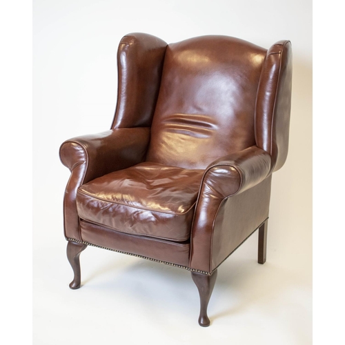 197 - WING ARMCHAIR, 107cm H x 84cm, Georgian style brown leather.