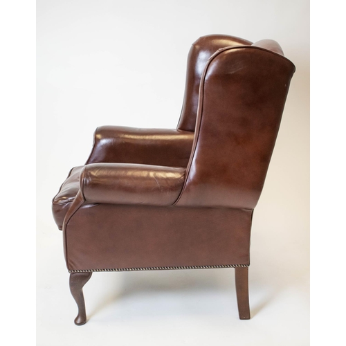 197 - WING ARMCHAIR, 107cm H x 84cm, Georgian style brown leather.