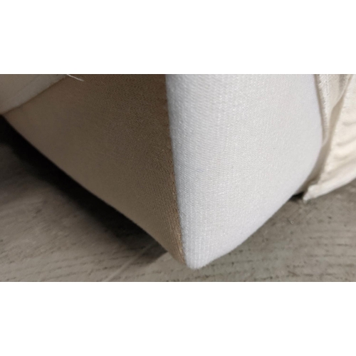 418 - POLIFORM SOFA, of curved form, in a loose white cover, 180cm W.