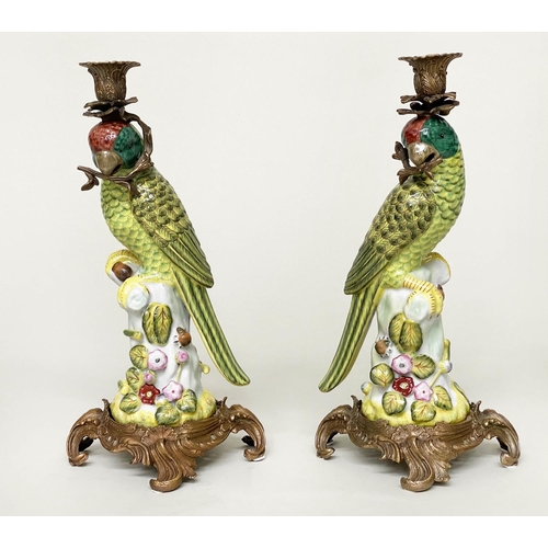 215 - PARROT CANDLESTICKS, a pair, Continental style painted porcelain and gilt metal mounted, 37cm H. (2)