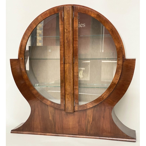 219 - 'CIRCULAR' ART DECO DISPLAY CABINET, circa 1930 figured walnut of circular form with two glazed pane... 