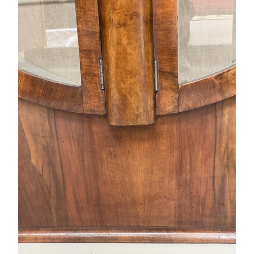 219 - 'CIRCULAR' ART DECO DISPLAY CABINET, circa 1930 figured walnut of circular form with two glazed pane... 