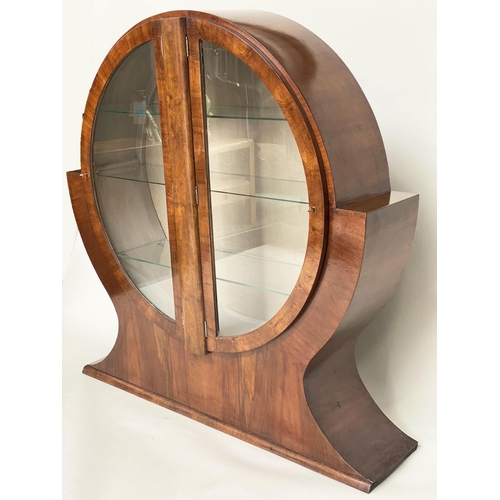 219 - 'CIRCULAR' ART DECO DISPLAY CABINET, circa 1930 figured walnut of circular form with two glazed pane... 