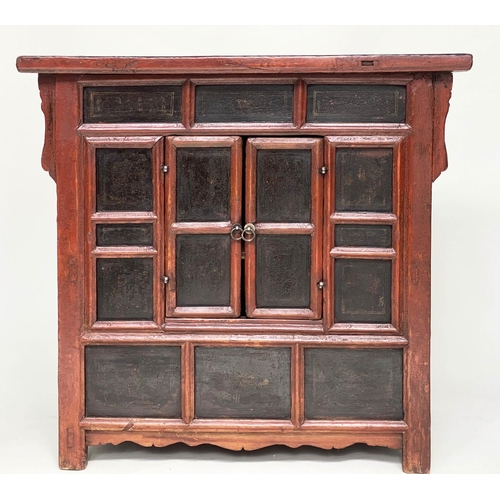 223 - CHINESE CABINET, 19th century scarlet firwood framed enclosing faint gilt decorated black lacquer pa... 