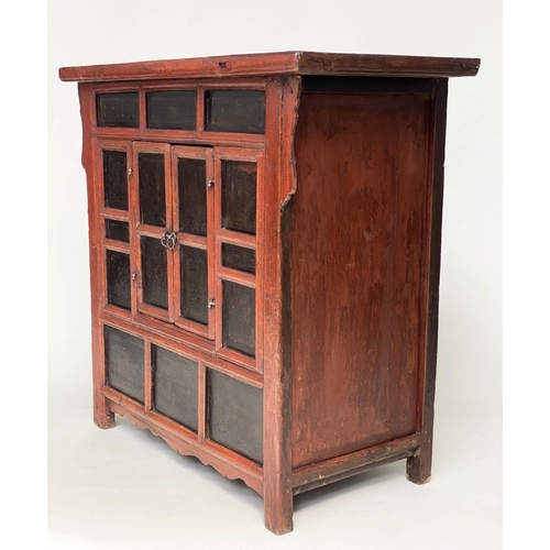 223 - CHINESE CABINET, 19th century scarlet firwood framed enclosing faint gilt decorated black lacquer pa... 