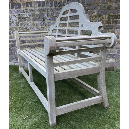 249 - LUTYENS STYLE GARDEN BENCH, weathered teak of slatted construction, 165cm W.