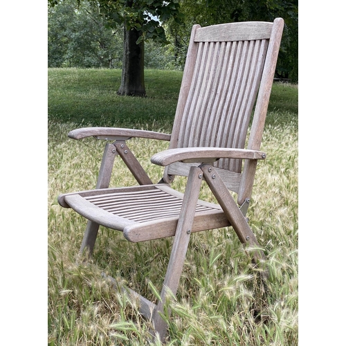 260 - INDIAN OCEAN GARDEN ARMCHAIR, nicely weathered teak reclining folding and slatted construction by In... 