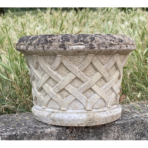 261 - GARDEN PLANTERS, a pair, well weathered reconstituted stone, circular with basket weave sides and sc... 