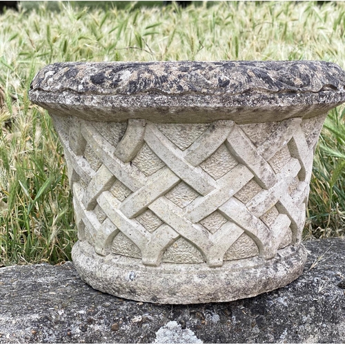 261 - GARDEN PLANTERS, a pair, well weathered reconstituted stone, circular with basket weave sides and sc... 