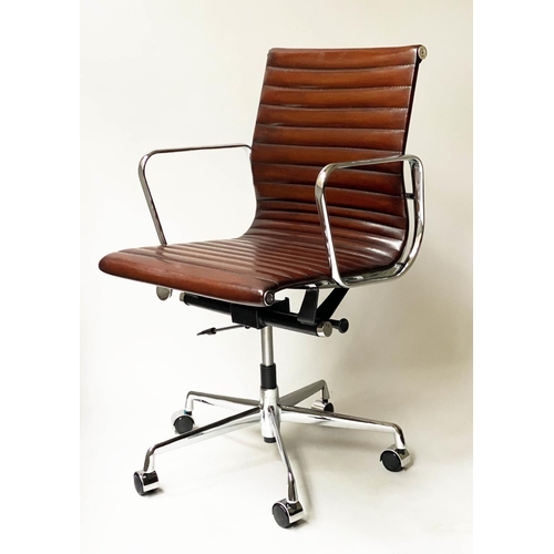 107 - REVOLVING DESK CHAIR, Charles and Ray Eames inspired with ribbed tan leather seat revolving and recl... 