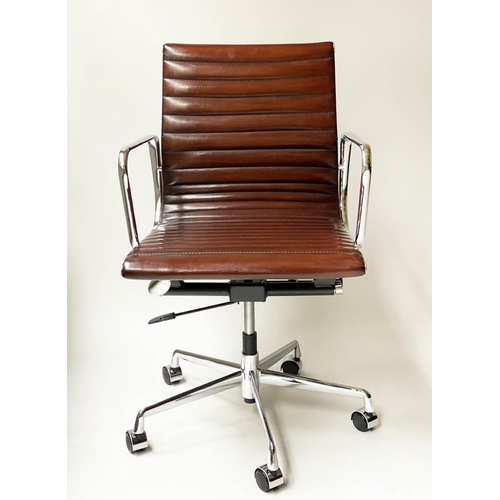 107 - REVOLVING DESK CHAIR, Charles and Ray Eames inspired with ribbed tan leather seat revolving and recl... 