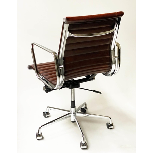 107 - REVOLVING DESK CHAIR, Charles and Ray Eames inspired with ribbed tan leather seat revolving and recl... 