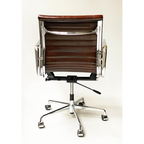 107 - REVOLVING DESK CHAIR, Charles and Ray Eames inspired with ribbed tan leather seat revolving and recl... 