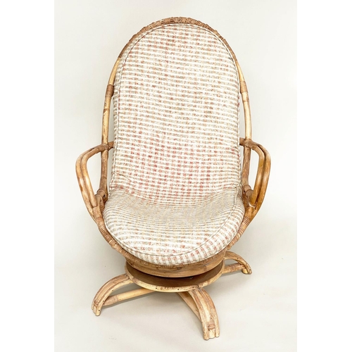 120 - TERRACE/VERANDAH ARMCHAIR, mid 20th century rattan framed and cane bound revolving and reclining (ro... 