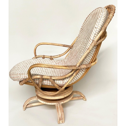 120 - TERRACE/VERANDAH ARMCHAIR, mid 20th century rattan framed and cane bound revolving and reclining (ro... 