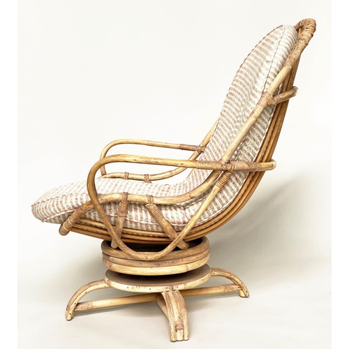 120 - TERRACE/VERANDAH ARMCHAIR, mid 20th century rattan framed and cane bound revolving and reclining (ro... 