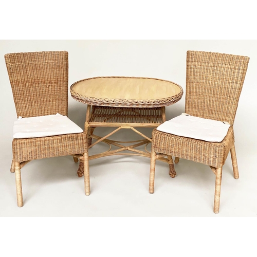 124 - CONSERVATORY TABLE AND CHAIRS, a pair, rattan framed and cane panelled with seat cushions and an ova... 