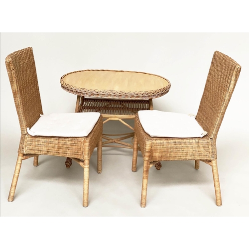 124 - CONSERVATORY TABLE AND CHAIRS, a pair, rattan framed and cane panelled with seat cushions and an ova... 