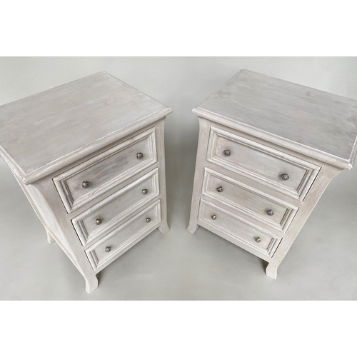 125 - BEDSIDE CHESTS, a pair, French style traditionally grey painted each with three drawers, 51cm W x 40... 