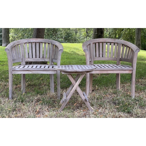 131 - GARDEN CURVED ARMCHAIRS, a pair, weathered teak each slatted with rounded backs, together with an un... 