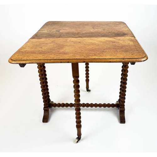 180 - SUTHERLAND TABLE, Victorian walnut on turned bobbin legs and stretcher on original ceramic castors, ... 