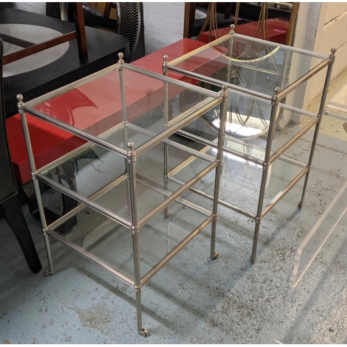 186 - OCCASIONAL TABLES, a pair, square three-tier form, steel frames, castor terminals, 72cm H x 44cm W.