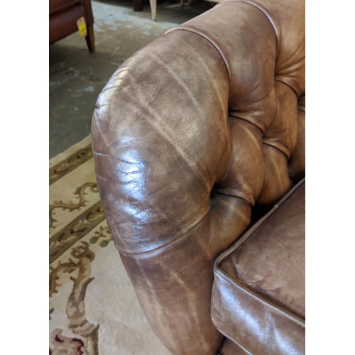 200 - SOFA, 227cm W x 108cm H, from Fleming Howland, in buttoned brown leather.