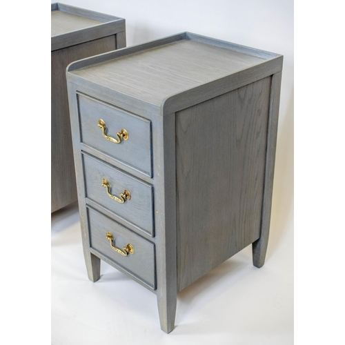 204 - BEDSIDE CHESTS, 74cm H x 39cm W x 48cm D, a pair, grey painted oak, each with three drawers. (2)