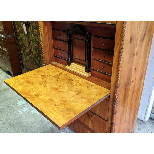 211 - SECRETAIRE, 105cm W x 54cm D x 171cm H,  Biedermeier cherrywood with a fitted interior and six exter... 