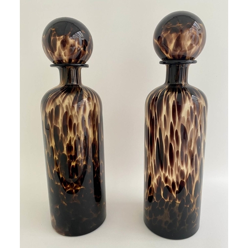 403 - DECANTERS, a pair, 40cm high, 10cm diameter, Murano style tortoiseshell glass, of cylindrical form. ... 