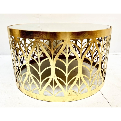 412 - LOW TABLE, 40cm high, 74cm diameter, 1970s Italian style, gilt metal, mirrored glass top, leaf pierc... 