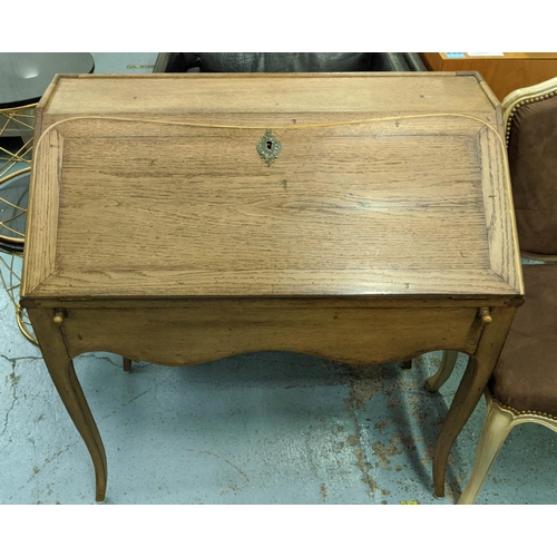 433 - BUREAU, oak, in the French taste, fall front enclosing fitted interior, drawers to ends, cabriole le... 