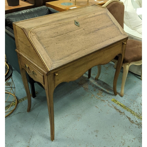 433 - BUREAU, oak, in the French taste, fall front enclosing fitted interior, drawers to ends, cabriole le... 