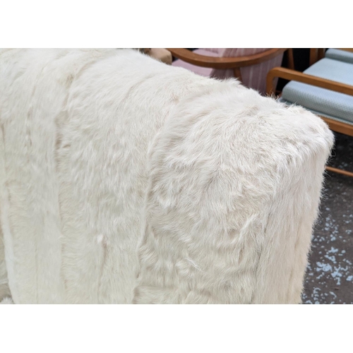 453 - DAYBED, 75cm D x 100cm H x 153cm L, in cream furry animal hide upholstery.