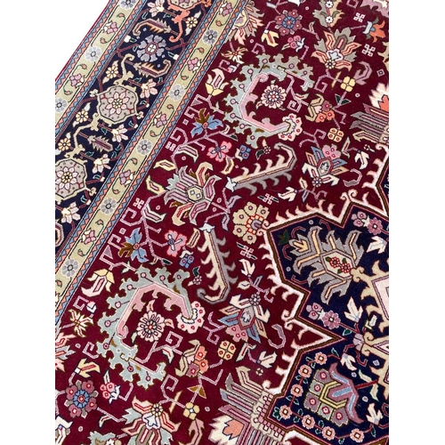 77 - PERSIAN PART SILK TABRIZ CARPET, 300cm x 200cm, Heriz design.