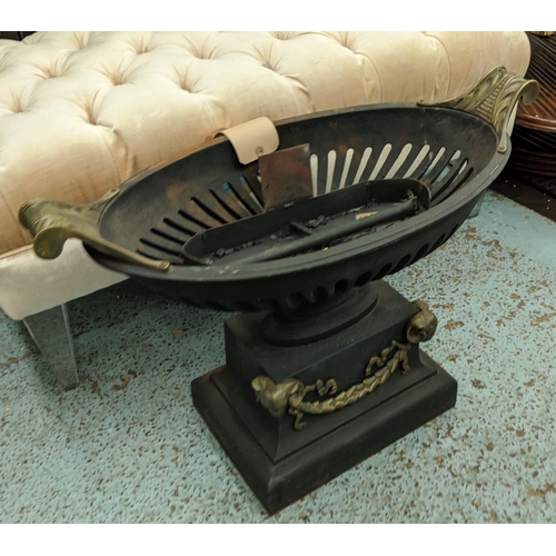 92 - URN FIRE GRATE, 68cm W x 50cm H with an oval shaped pierced basket on a plinth base decorated with r... 