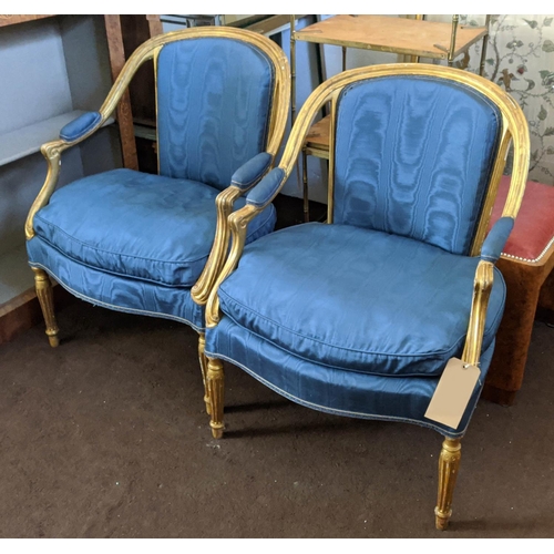 94 - OPEN ARMCHAIRS, a pair, 65cm W x 87cm H 19th century Continental giltwood framed with blue upholster... 