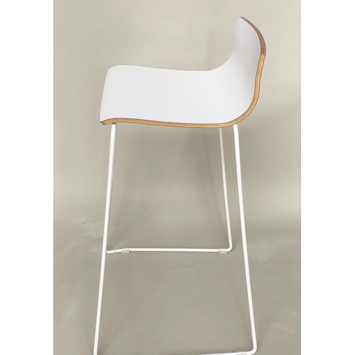 298 - BAR STOOLS, a set of six stacking with white seats and metals supports, 55cm w x 90cm H.