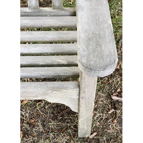 133 - 'LISTER GARDEN BENCH, well weathered teak slatted with broad flat top arms, 162cm W.