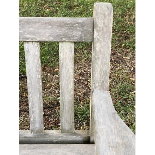 133 - 'LISTER GARDEN BENCH, well weathered teak slatted with broad flat top arms, 162cm W.