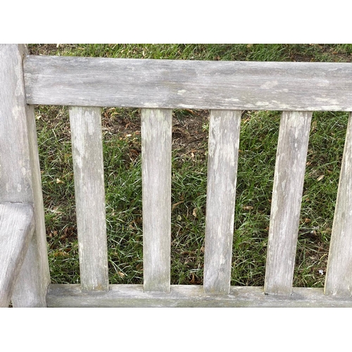 133 - 'LISTER GARDEN BENCH, well weathered teak slatted with broad flat top arms, 162cm W.