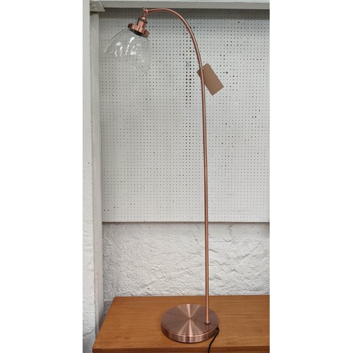 364 - FLOOR LAMP, 150cm H in a copper finish with a glass shade.